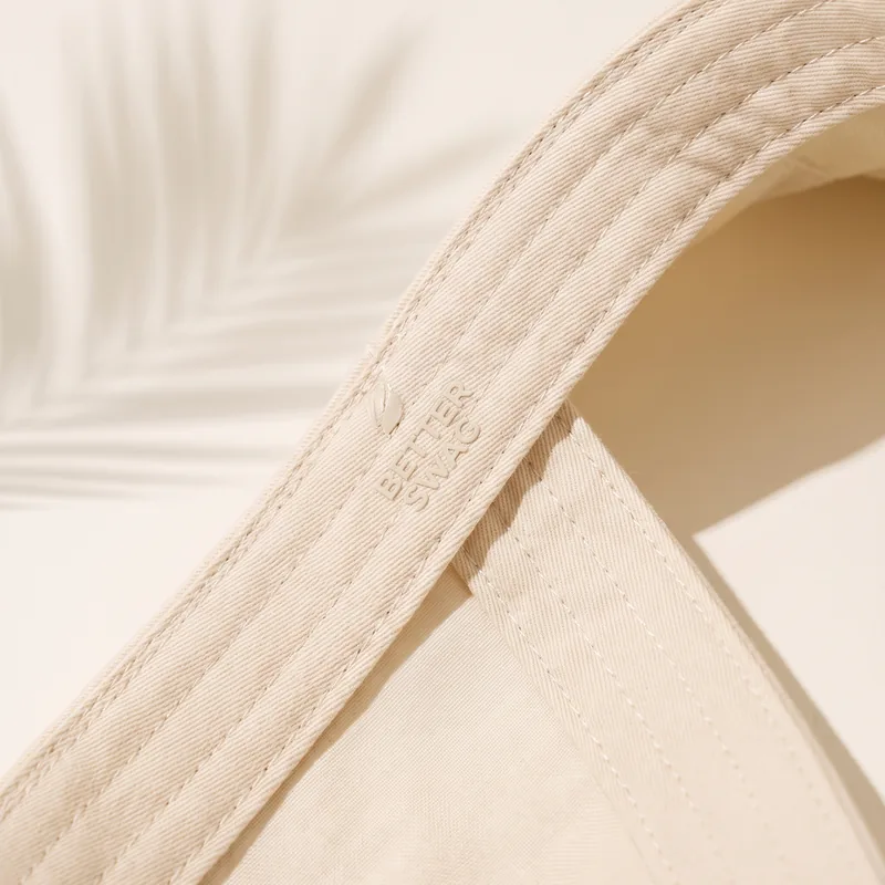 Taped seam detail on cream fabric